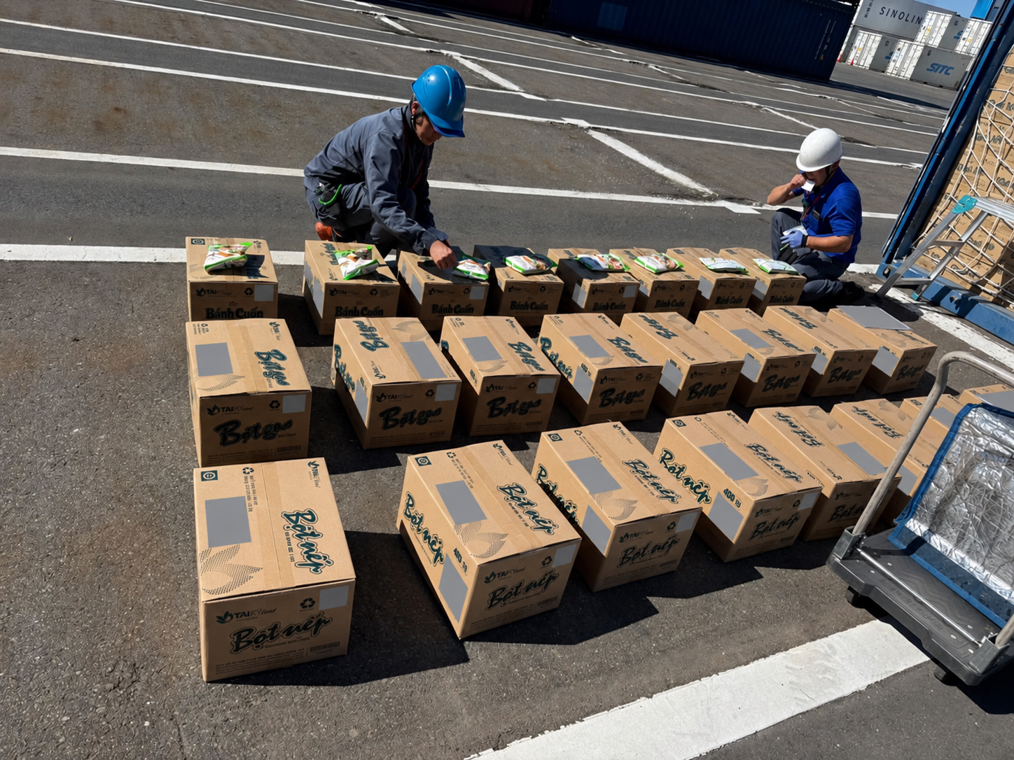 Packaged products arranged beside a container