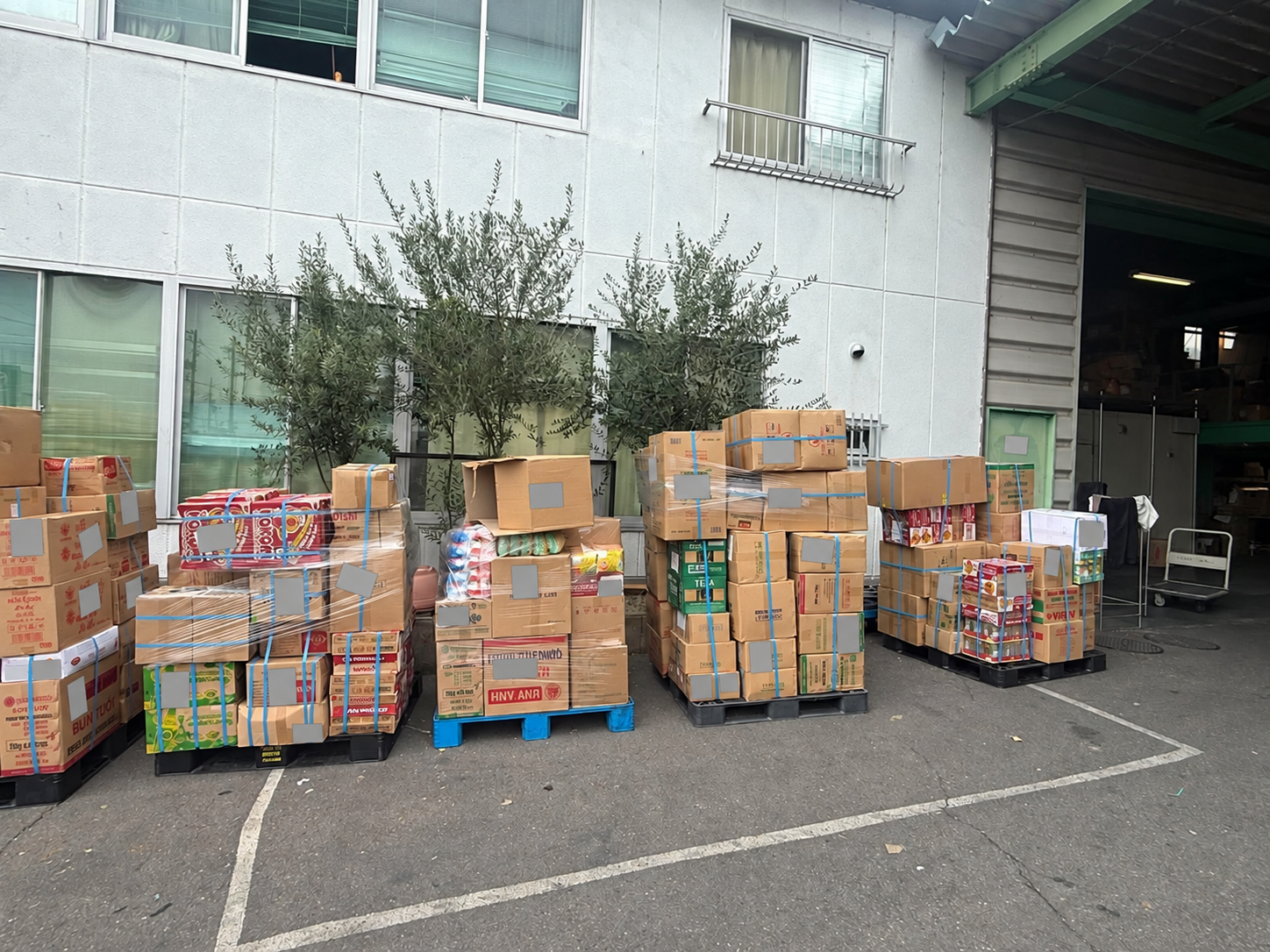 Palletised cartons at a loading area